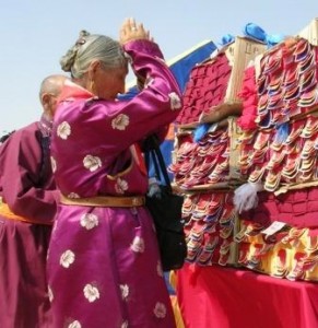 Dornogov -- Shambhala -- First Anniversary -- Old Woman in Purple Worshiping Texts -- WS